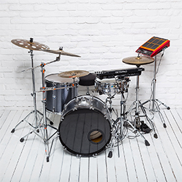 Hybrid drum kit with electronic pads